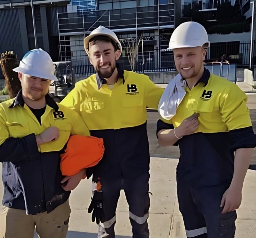 Harrison Barratt Group crew — real workers in HBG hi-vis on site